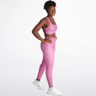 Woman in a green Synergetic Heroes tracksuit with bold sleeve branding, standing against a white background. This stylish, comfortable athleisure set is perfect for casual wear, workouts, and active lifestyles. Shop Synergetic Heroes apparel today!