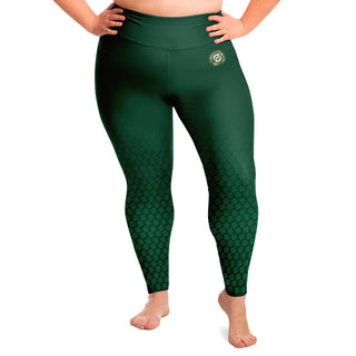 "Plus-size woman modeling high-waisted green Synergetic Heroes leggings with a sleek design and logo detail. Comfortable, form-fitting activewear ideal for workouts, yoga, or casual wear.